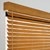 Detail close up of the 2 inch faux wood blinds in the realgrain honey oak color.