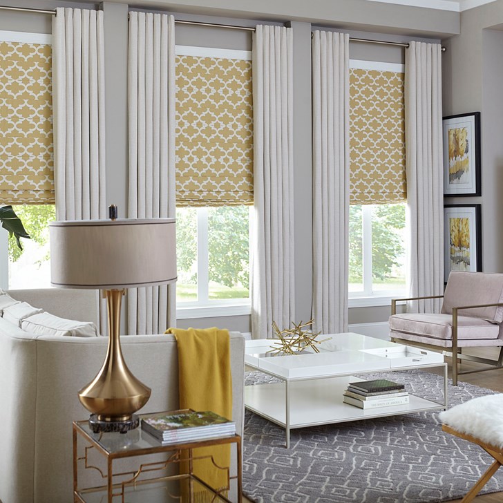 The classic roman shades paired with the easy grommet drapery. Roman Shade Color: Casablanca Sun 984 & Drapery Color: Brisbane Sand Dollar