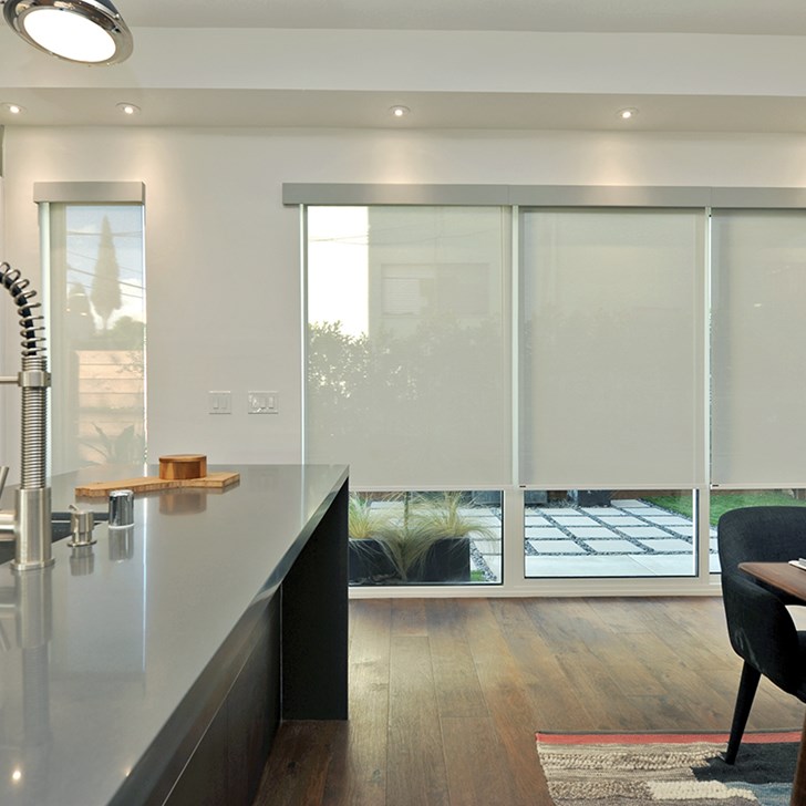 Natural color roller shade with a common valance in color: Sheer Linen Cream F0908