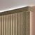 Detailed close up of the PVC vertical blinds in the emerson amber color featuring the headrail.