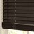 Detailed close up of the 2in wood blinds in the charcoal color.