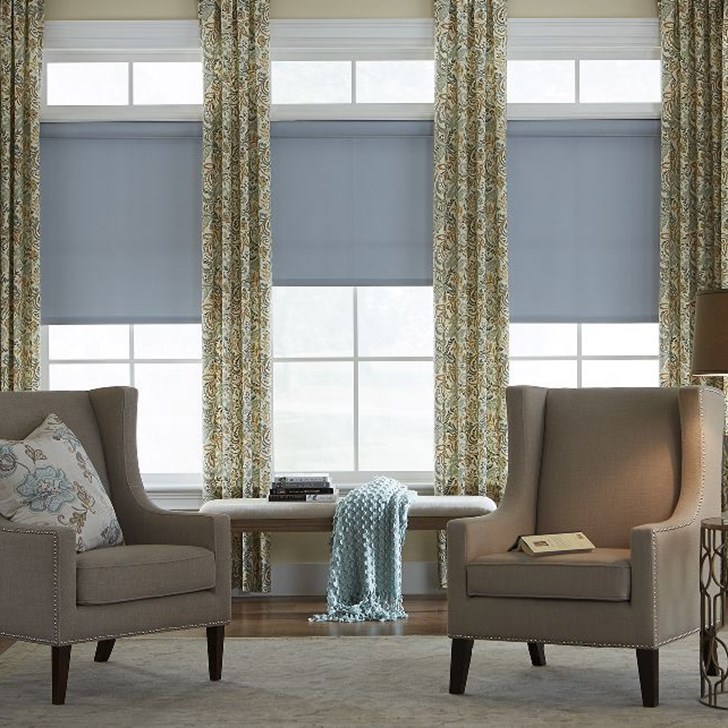 Drapery Panels are a stylish yet classic choice to layer over roller shades. Pattern shown here is Venice Grand Canal.
