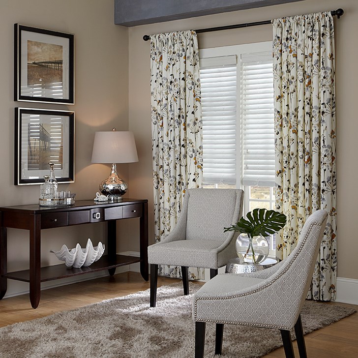 Blinds.com Easy Rod Pocket Drapery in pattern LeJardin Tan paired with Blinds.com 2in Architectural Wood Blind shown in the color Vintage Wild Rice.