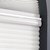 Detailed close up shot of the premium light filtering cellular shades in the koala C5816 color.