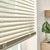 Detailed close up of the 1 inch mini blinds in the flaxen color.