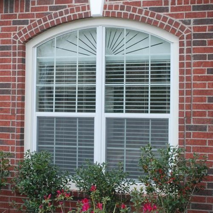 Outside view of an elongated arch in Sunburst style.