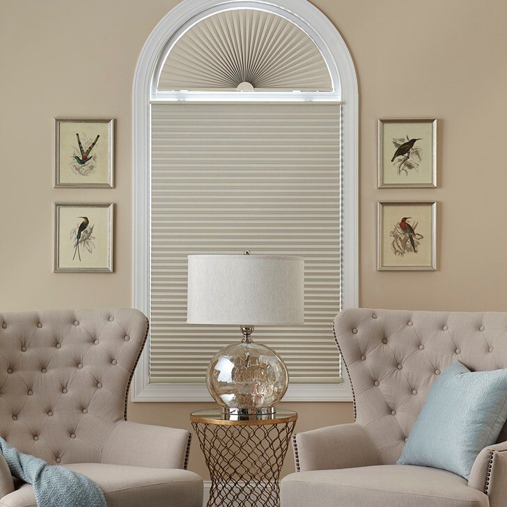The blackout cellular shade paired with the blackout cellular arch. Color: Early Light SBB702